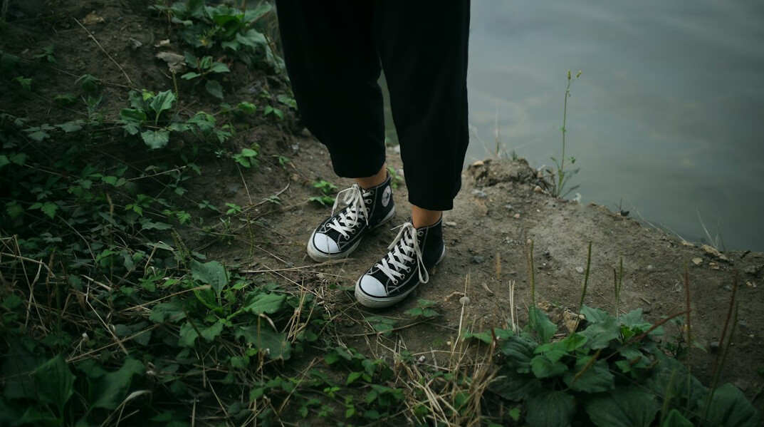 person taking small steps outdoors