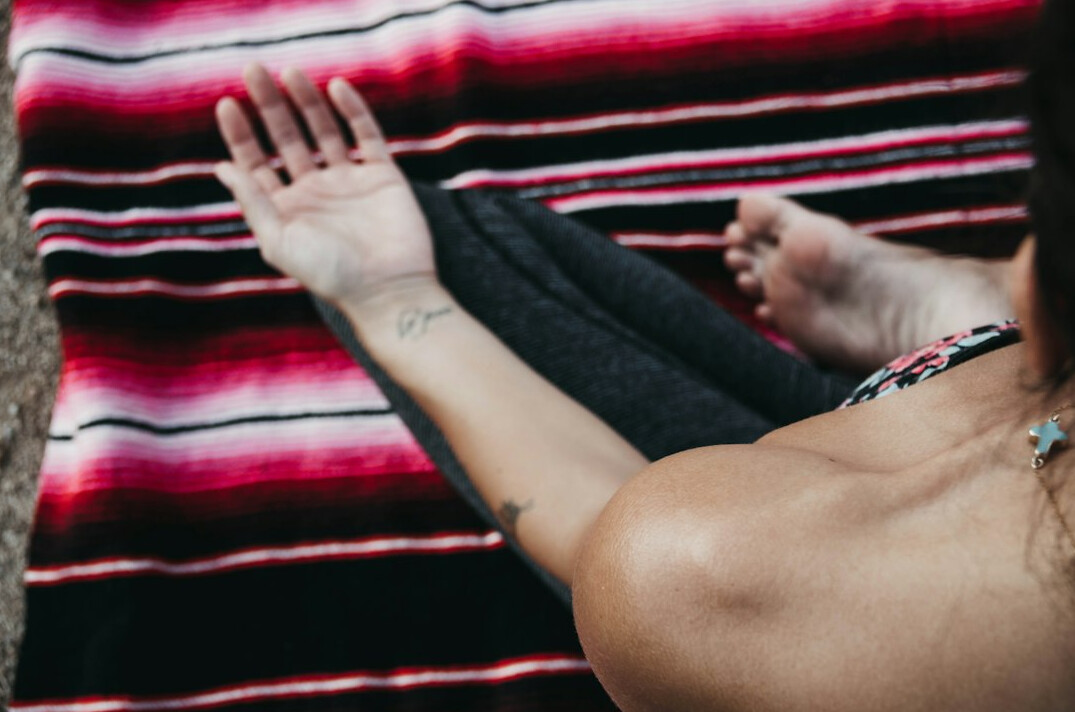 person relaxing after yoga