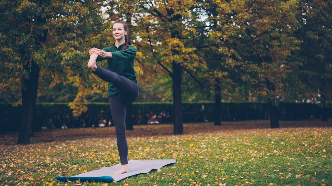 woman meditating in peaceful garden