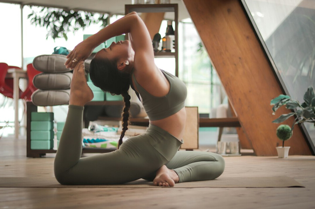 woman practicing yoga for mind and body